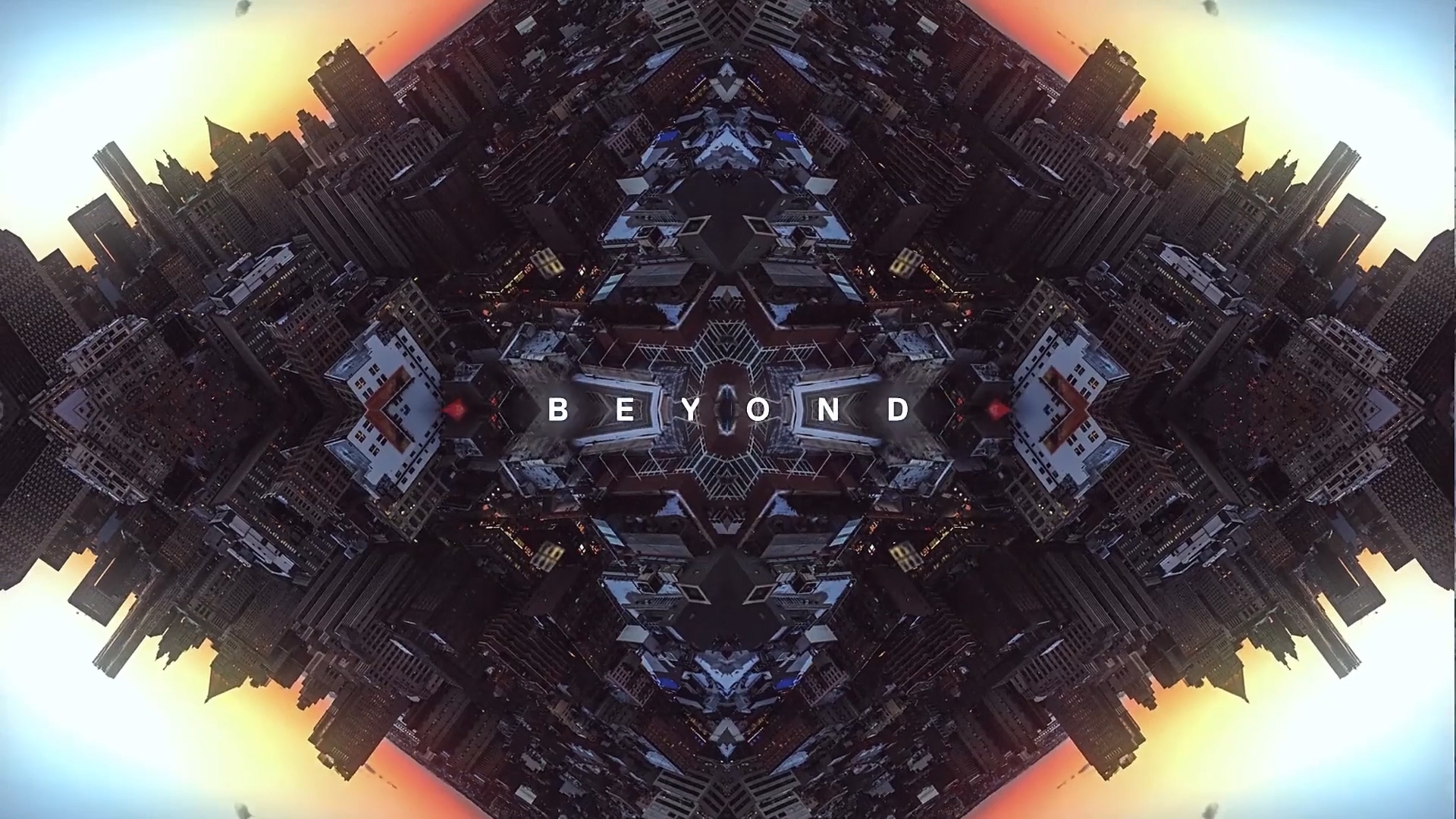 An image from an opening event video for EMC. There is a city as scene through a kaleidoscope with the word 'beyond' over it.